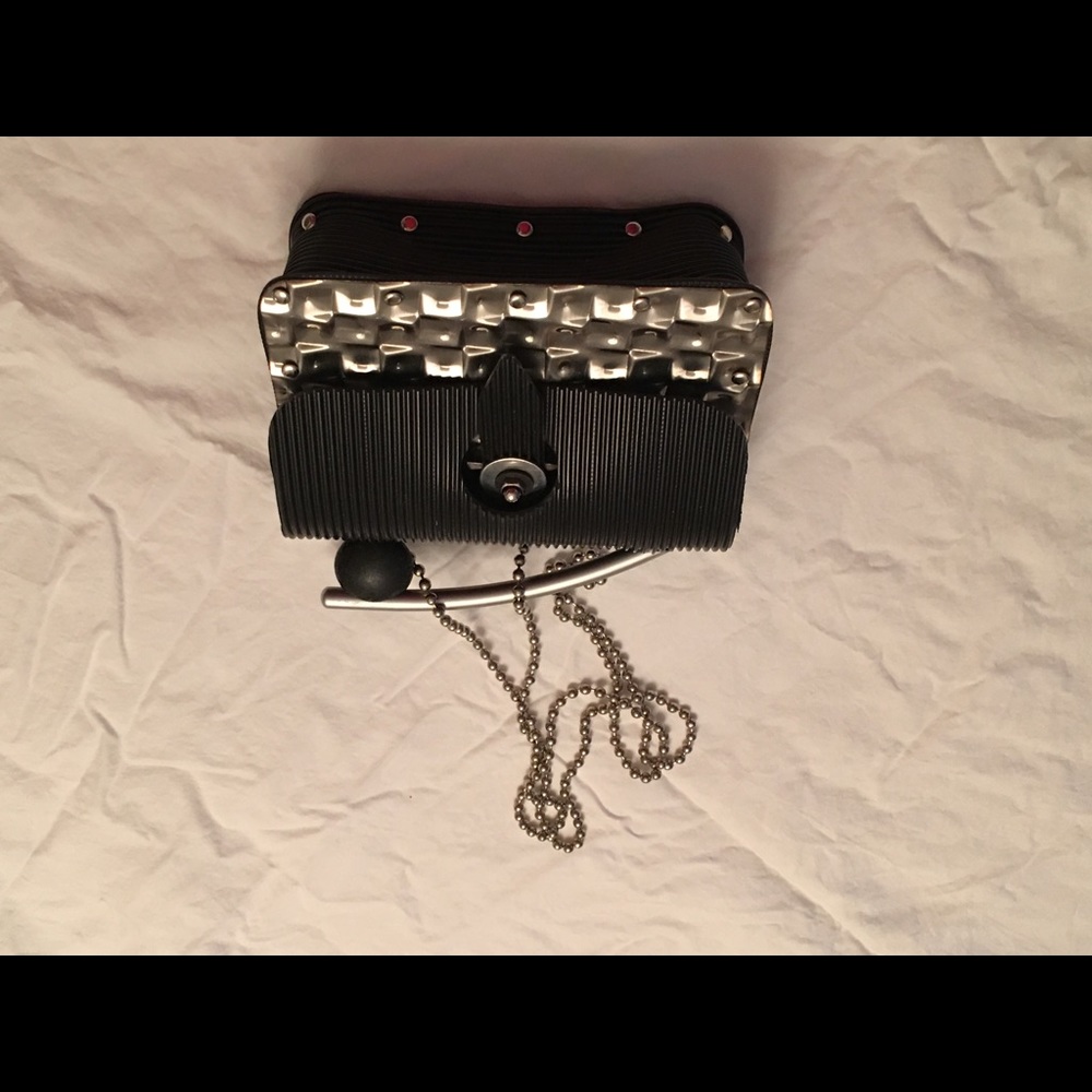 Gorgeous bag with metal and rubber